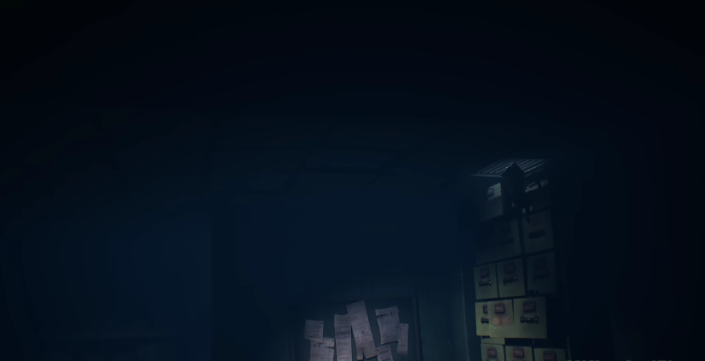 Dim room with papers on wall and cabinets