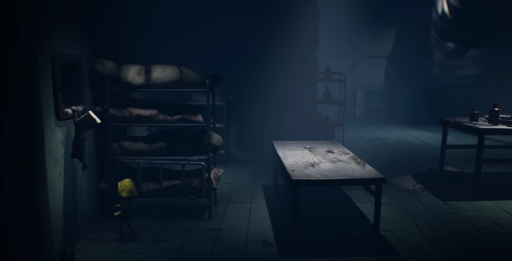 Yellow raincoat child walks past bunk beds in dark room