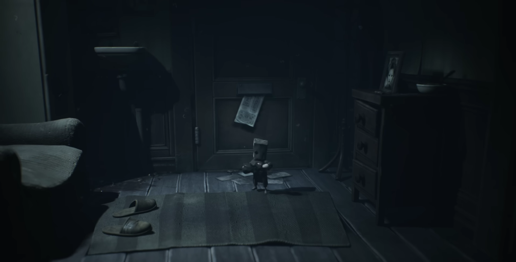 Paper Bag Boy walks in dark room, Little Nightmares II
