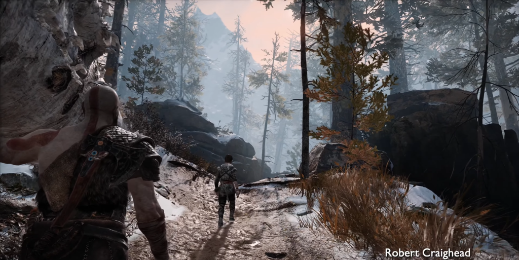 Kratos follows Atreus on snowy forest path in God of War