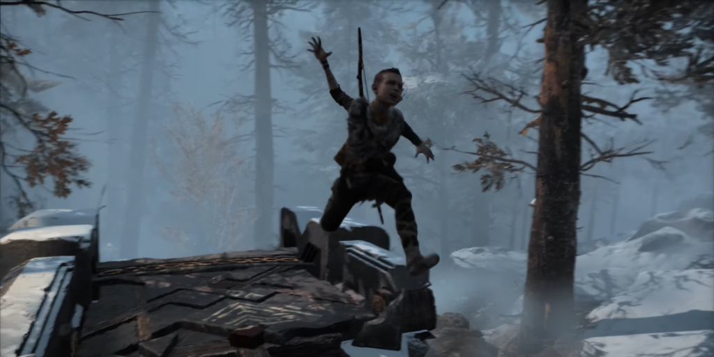 Boy jumping off wreckage in snowy forest