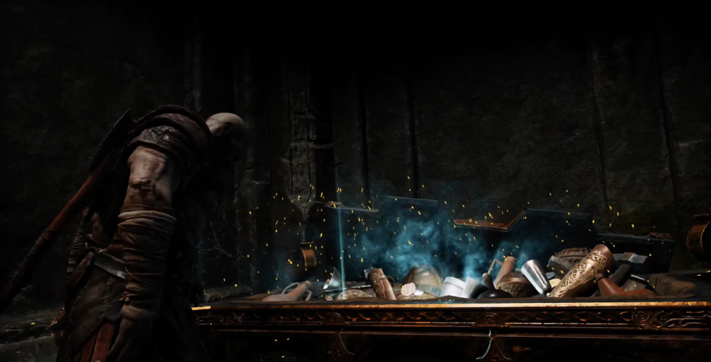 Kratos opens glowing chest in dark stone room
