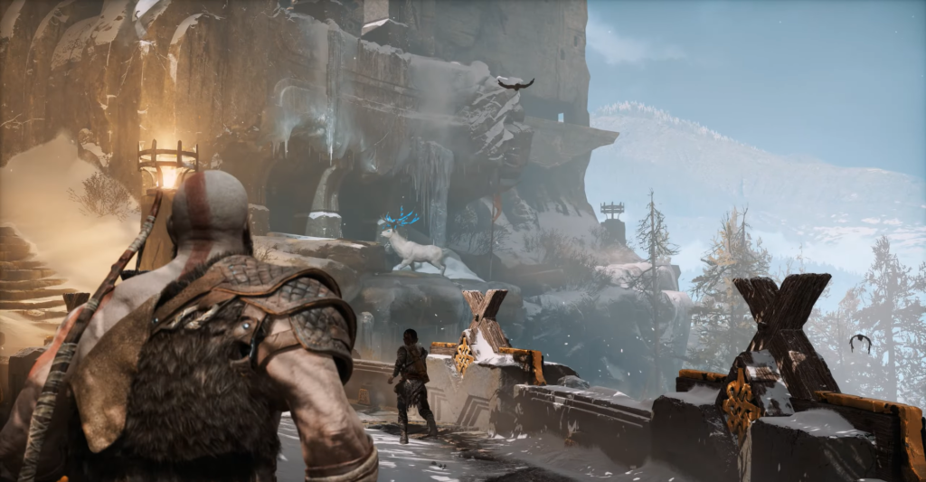 Kratos walks on snowy bridge in God of War