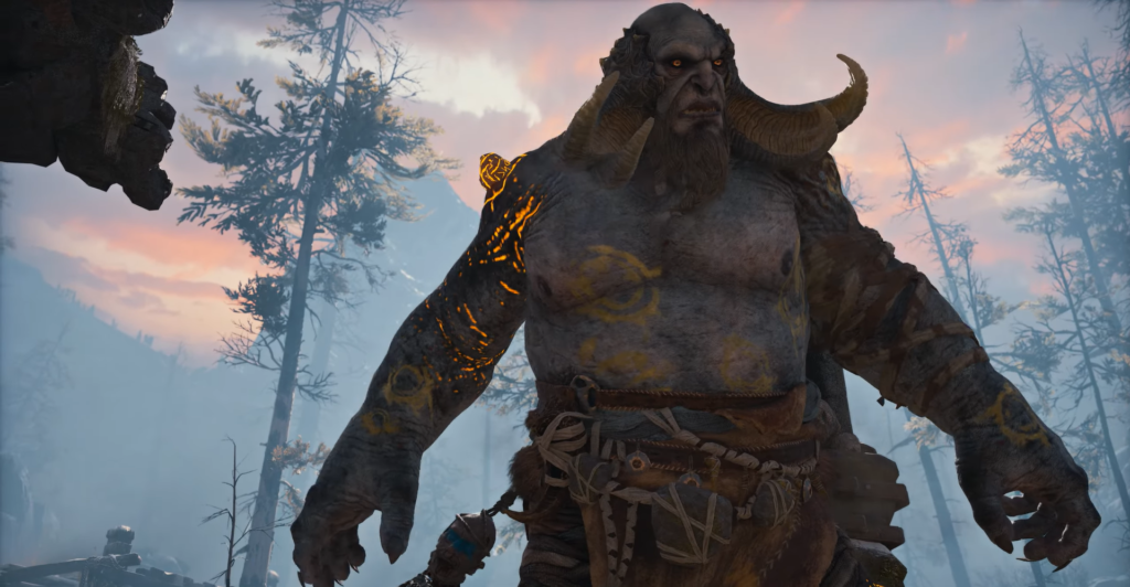 Horned giant standing in misty forest at sunset