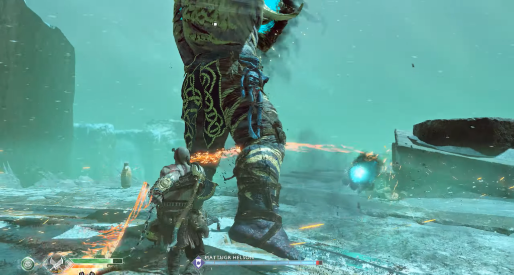 Kratos fights giant in snowy arena, God of War