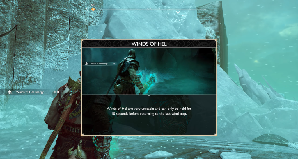 Kratos holding blue energy in icy cave, God of War