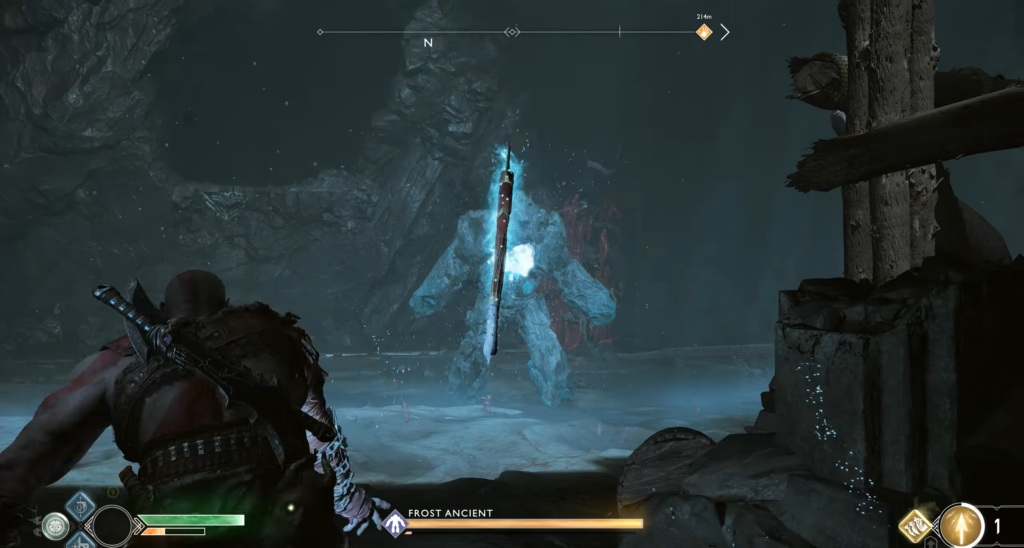 Kratos fights Frost Ancient in icy cave arena