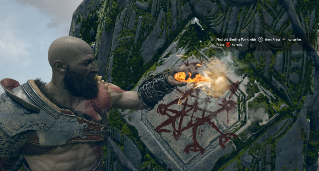 Kratos strikes rune stone in God of War