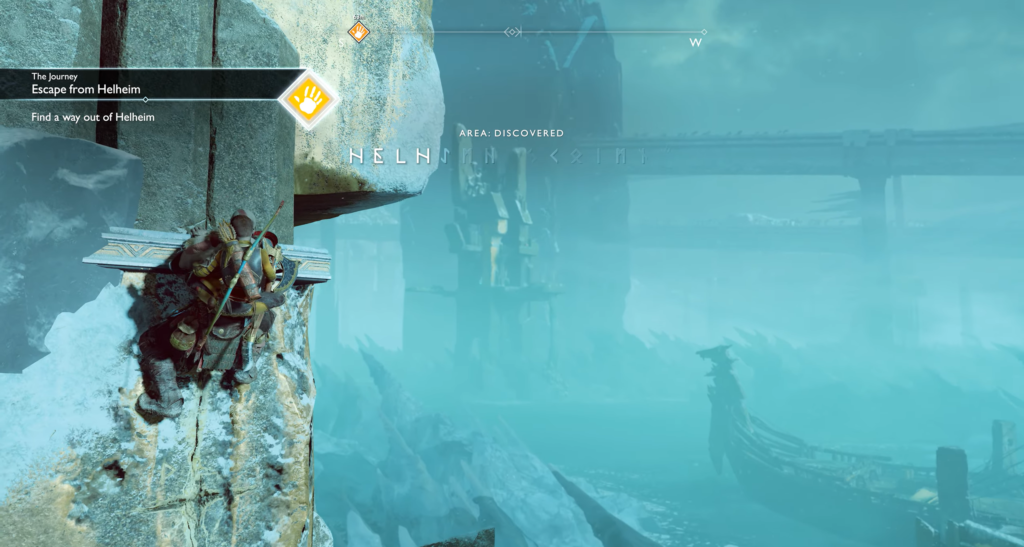 Kratos climbs cliff in Helheim, God of War