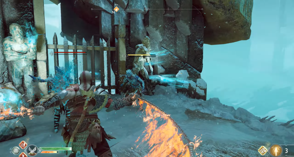Kratos attacks enemies with flaming blades in God of War