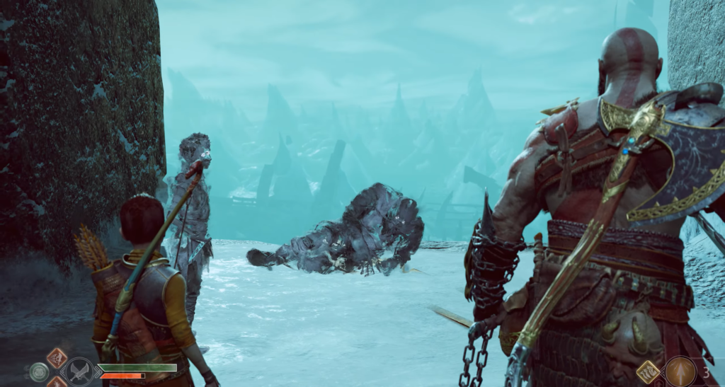 Kratos and Atreus face fallen troll in snowy realm