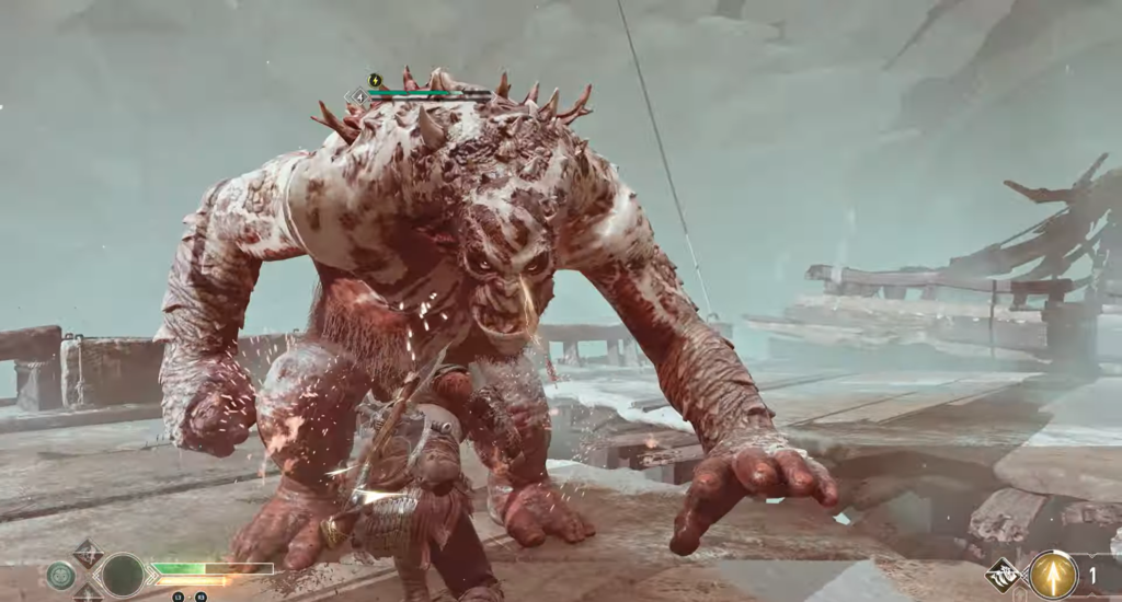 Kratos fights troll boss in God of War arena