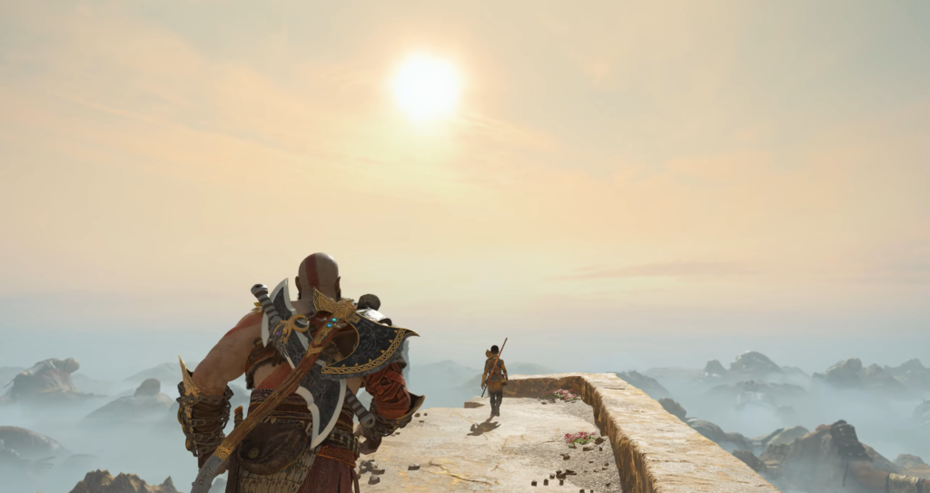 Kratos watches Atreus on cliff at sunrise