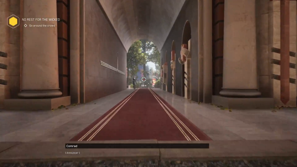 Red carpet leading through stone archway corridor