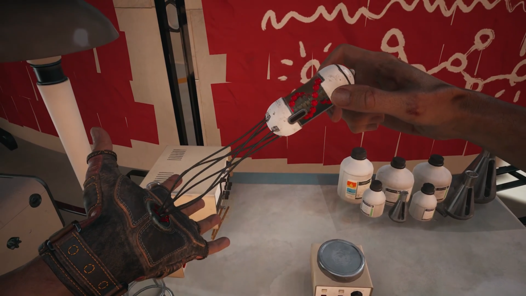 Hands holding device over lab table