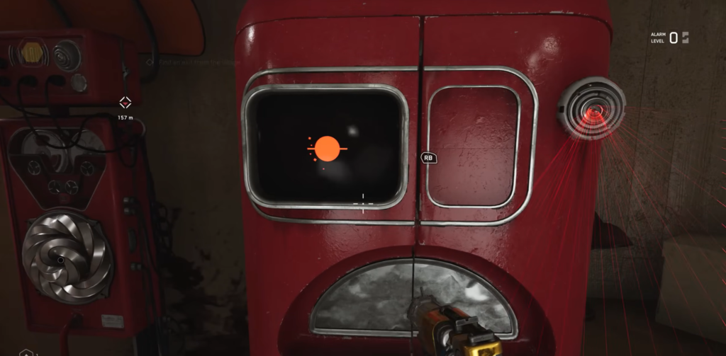 Gun aimed at red control panel with laser sensor