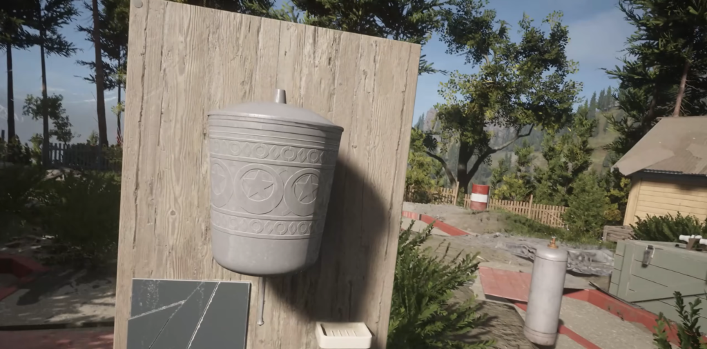 Gray container mounted on wooden board outdoors