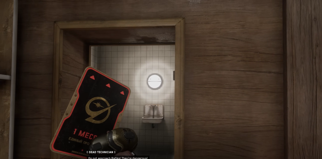 Gloved hand holding keycard at tiled doorway