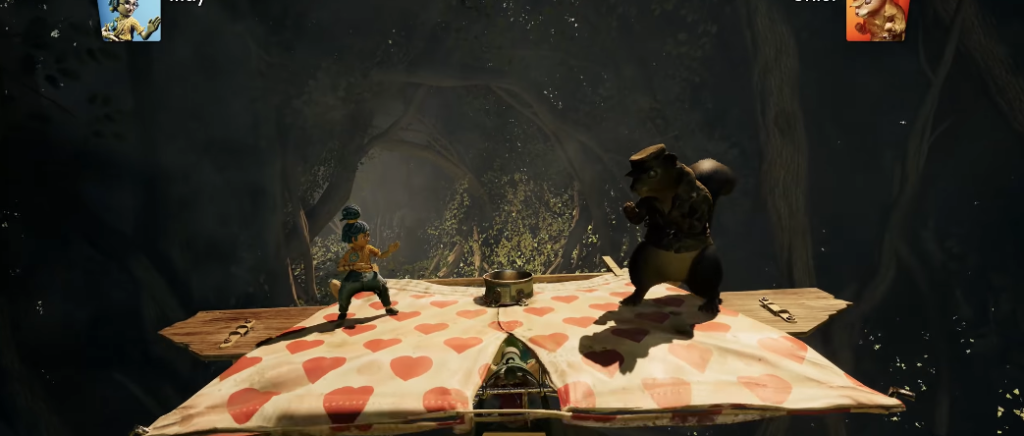 May and Cody fight on heart-patterned book in forest