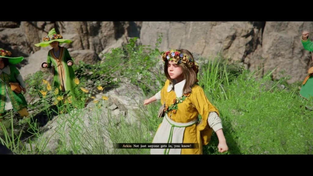 Girl wearing flower crown stands in grassy rocks